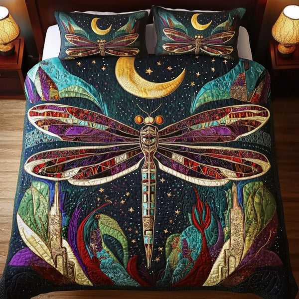 Tranquil Flight quilted 3-piece bedding set on a made bed with two matching pillow shams