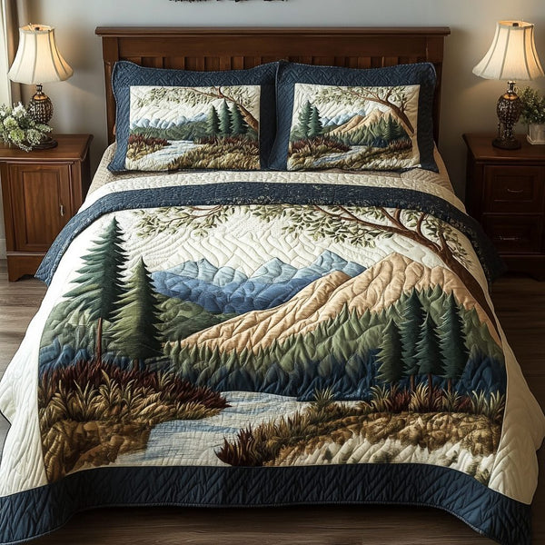 Tranquil Forest quilted 3-piece bedding set on a made bed with two matching pillow shams