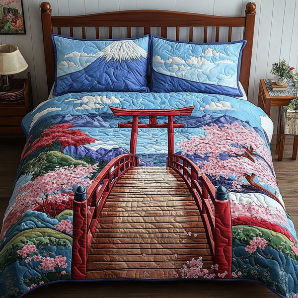Tranquil Fuji quilted 3-piece bedding set on a made bed with two matching pillow shams