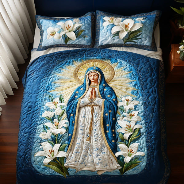 Tranquil Guardian quilted 3-piece bedding set on a made bed with two matching pillow shams