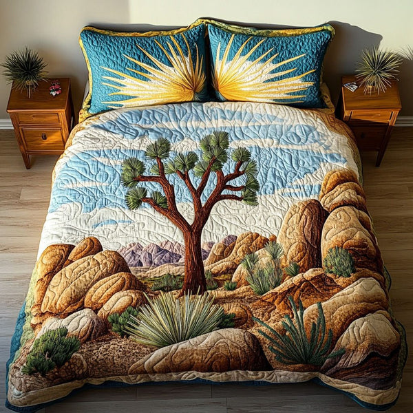 Tranquil Joshua quilted 3-piece bedding set on a made bed with two matching pillow shams