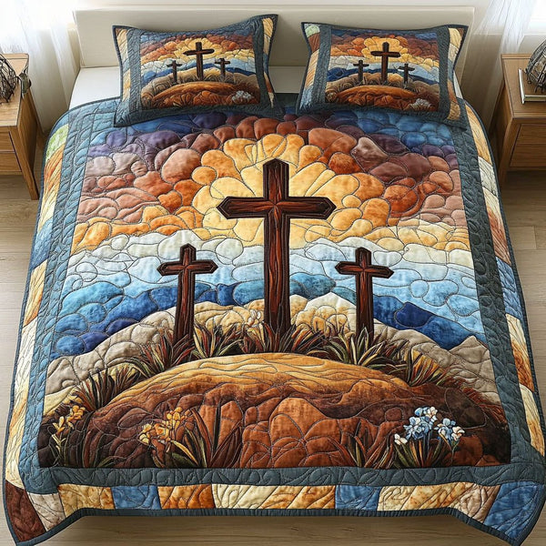 Tranquil Morning Crosses quilted 3-piece bedding set on a made bed in a softly lit bedroom