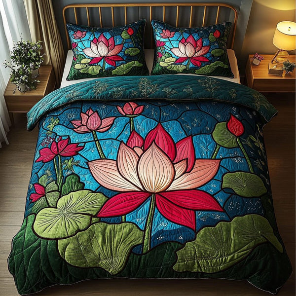 Tranquil Petals quilted 3-piece bedding set on a made bed with two matching pillow shams