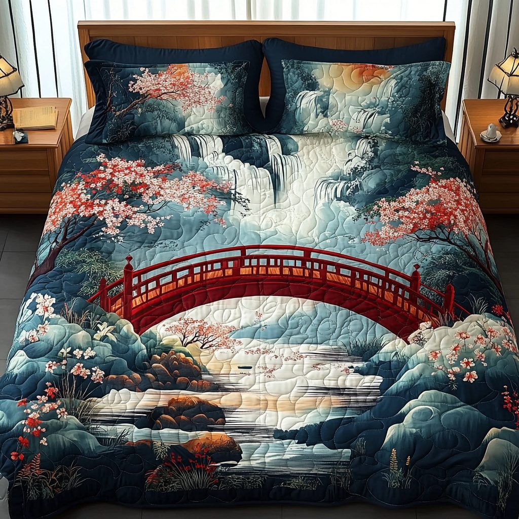 Tranquil Sakura quilted 3-piece bedding set on a made bed with two matching pillow shams
