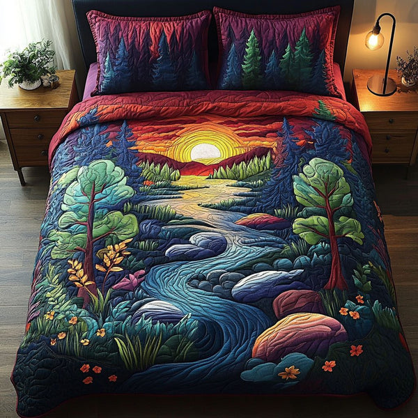 Tranquil Sunrise quilted 3-piece bedding set on a made bed with two matching pillow shams