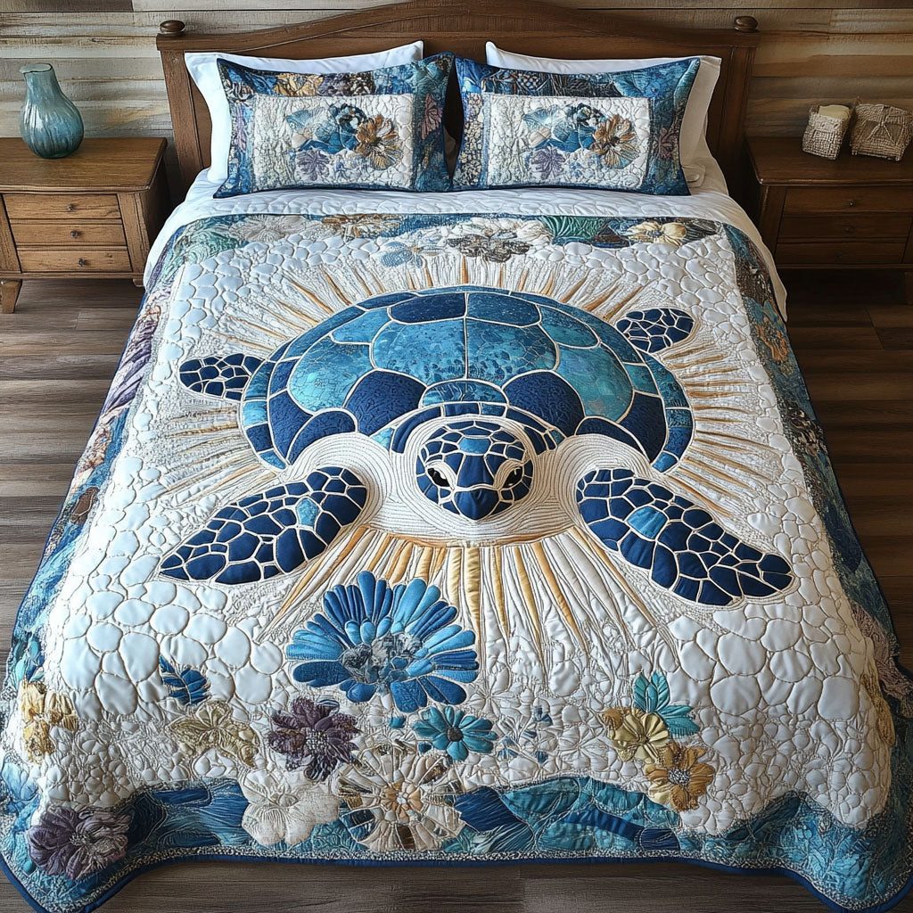 Tranquil Tides quilted 3-piece bedding set on a made bed with two matching pillow shams
