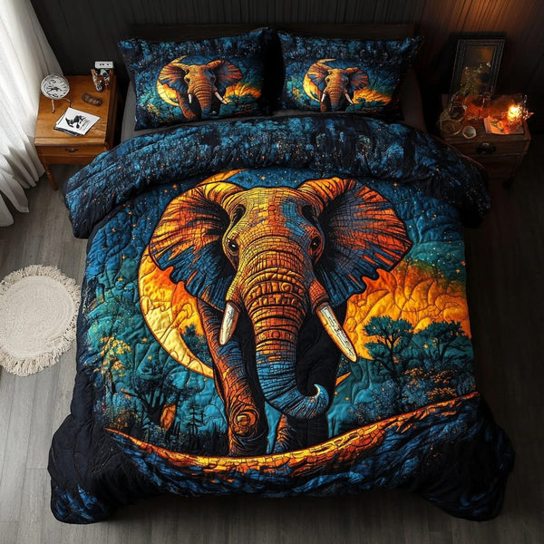Tranquil Tusk quilted 3-piece bedding set on a made bed with two matching pillow shams