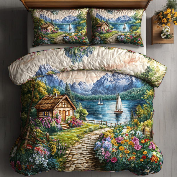 Tranquil Valley quilted 3-piece bedding set on a made bed with two matching pillow shams