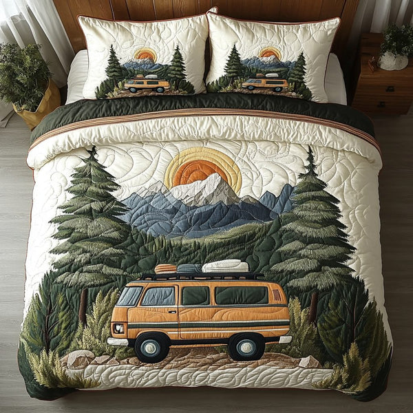 Travel Wheels quilted 3-piece bedding set on a made bed with two matching pillow shams
