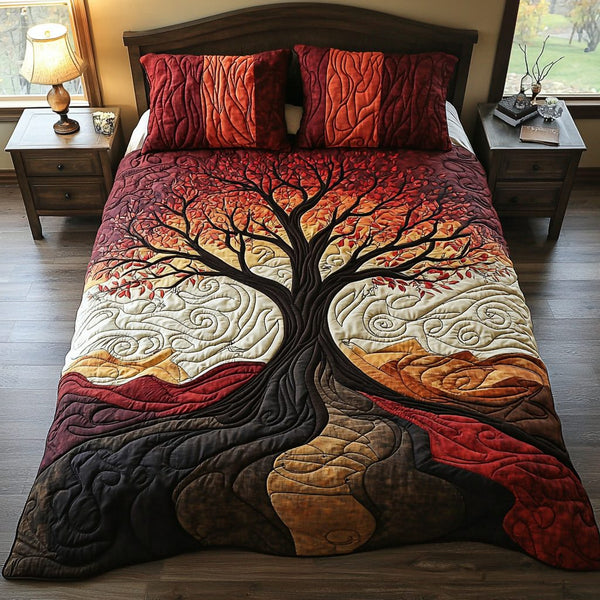 Tree of Harmony quilted 3-piece bedding set on a made bed with two matching pillow shams