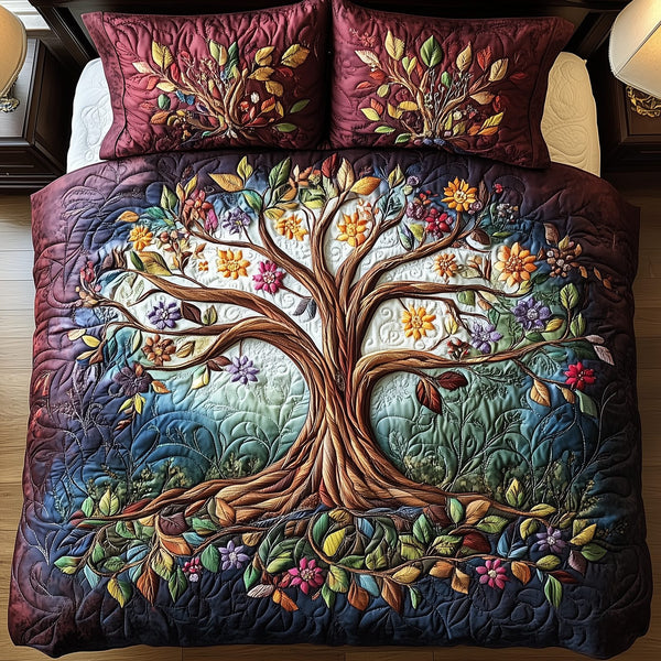Tree Of Life quilted 3-piece bedding set on a made bed with two matching pillow shams