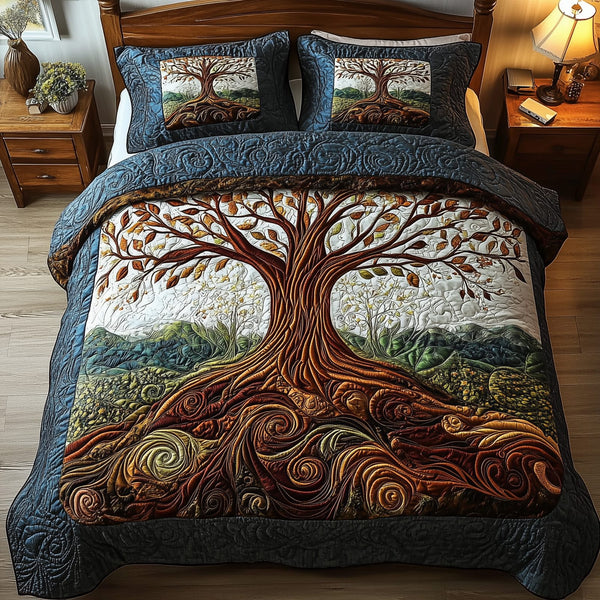 Tree Of Life quilted 3-piece bedding set on a made bed with two matching pillow shams