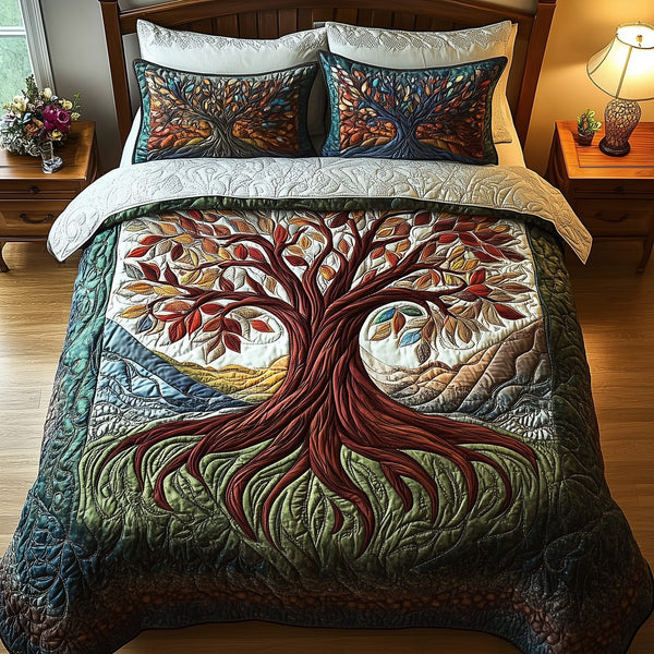 Tree Of Life quilted 3-piece bedding set on a made bed with two matching pillow shams