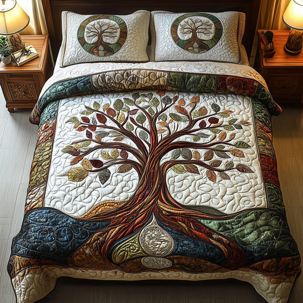 Tree Of Life quilted 3-piece bedding set on a made bed with two matching pillow shams