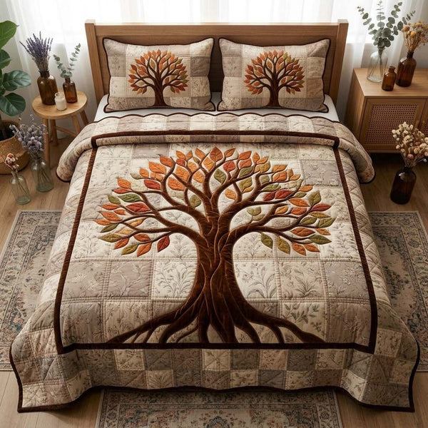 Tree Of Life quilted 3-piece bedding set on a made bed with two matching pillow shams