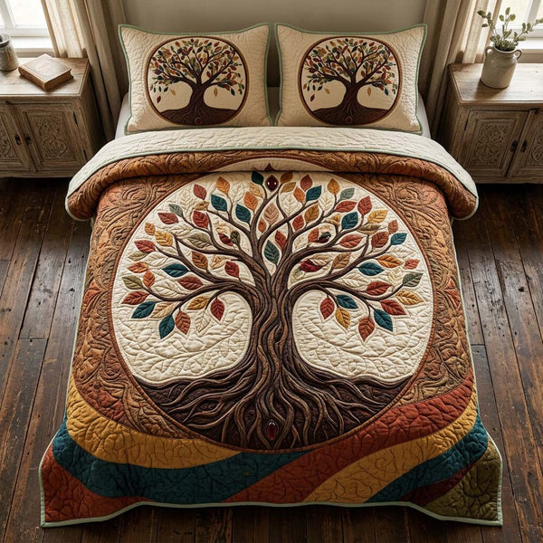 Tree Of Life quilted 3-piece bedding set on a made bed with two matching pillow shams
