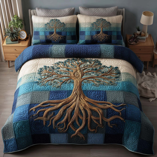 Tree Of Life quilted 3-piece bedding set on a made bed with two matching pillow shams