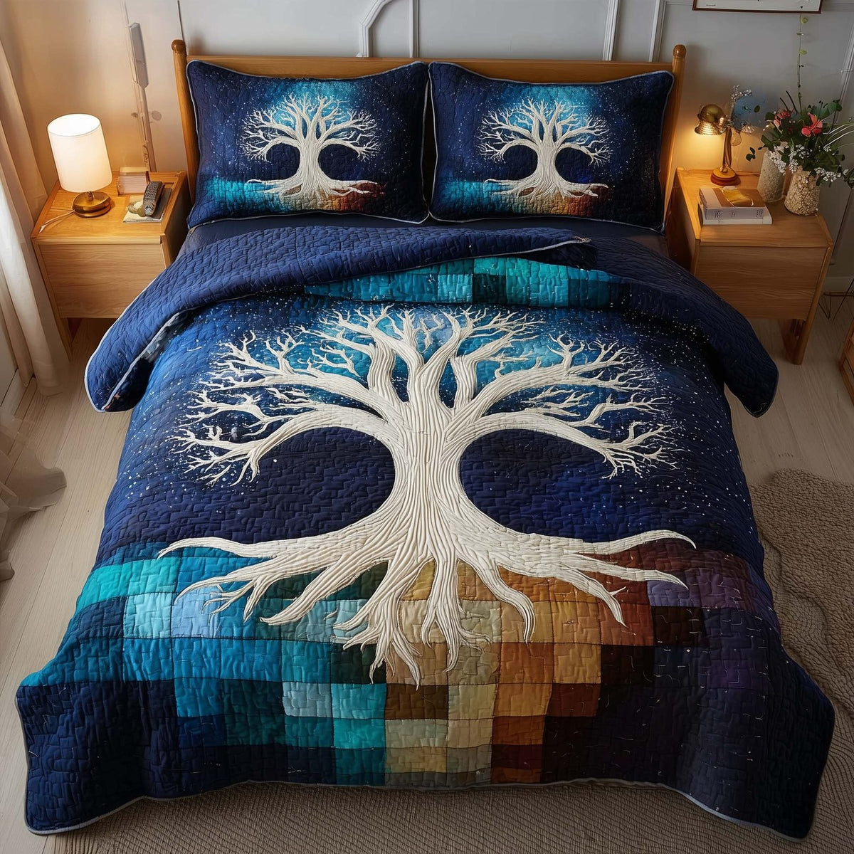 Tree Of Life quilted 3-piece bedding set on a made bed with two matching pillow shams