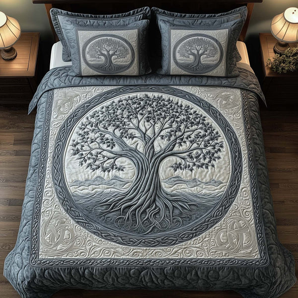 Tree Of Life quilted 3-piece bedding set on a made bed with two matching pillow shams