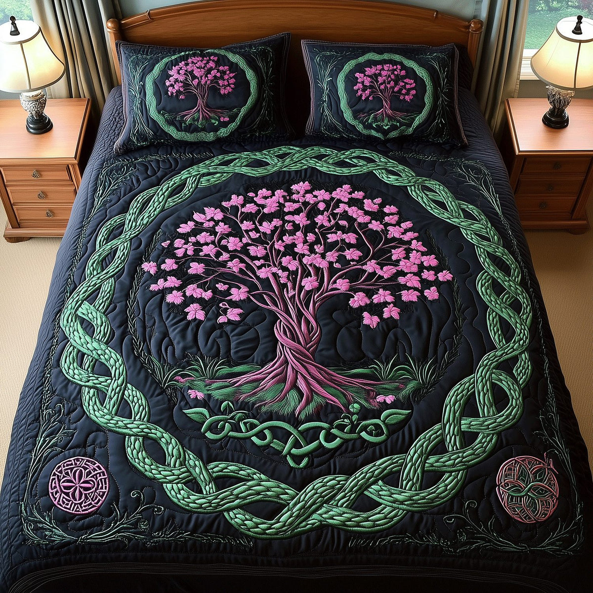 Tree of Unity quilted 3-piece bedding set on a made bed with two matching pillow shams