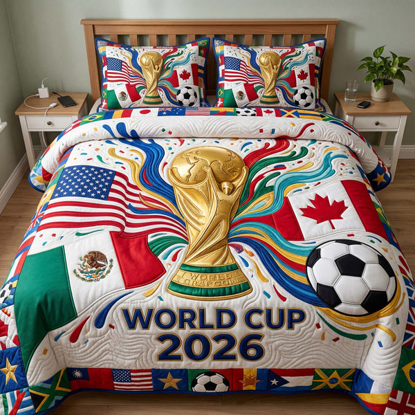 Tri Nation Trophy quilted 3-piece bedding set on a made bed with two matching pillow shams