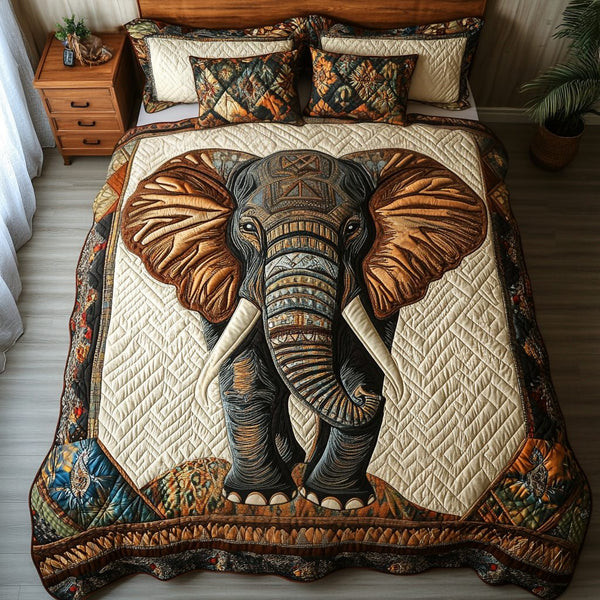 Tribal Beauty quilted 3-piece bedding set on a made bed with two matching pillow shams
