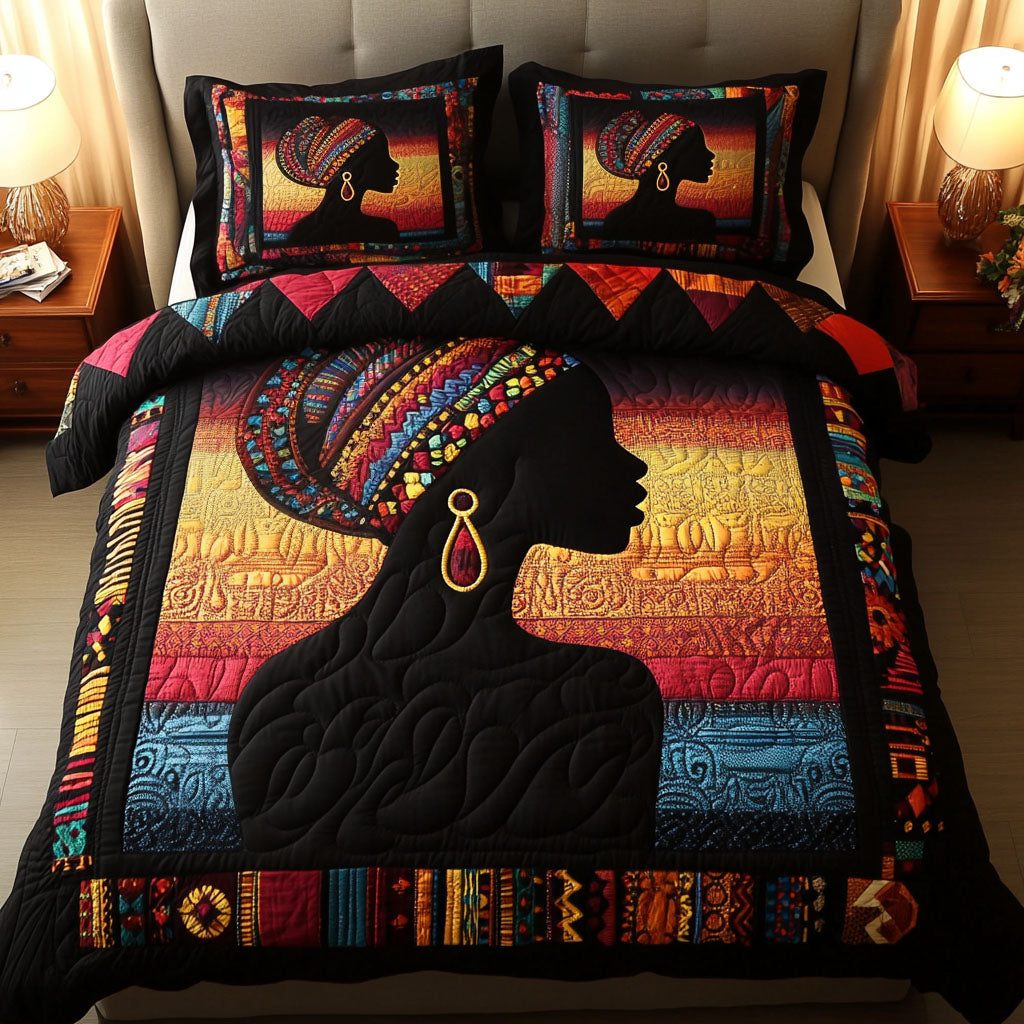 Tribal Beauty quilted 3-piece bedding set on a made bed with two matching pillow shams
