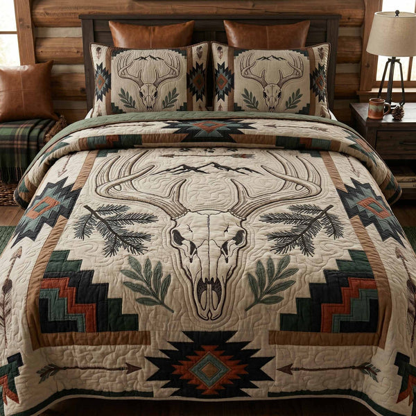 Tribal Deer quilted 3-piece bedding set on a made bed with two matching pillow shams