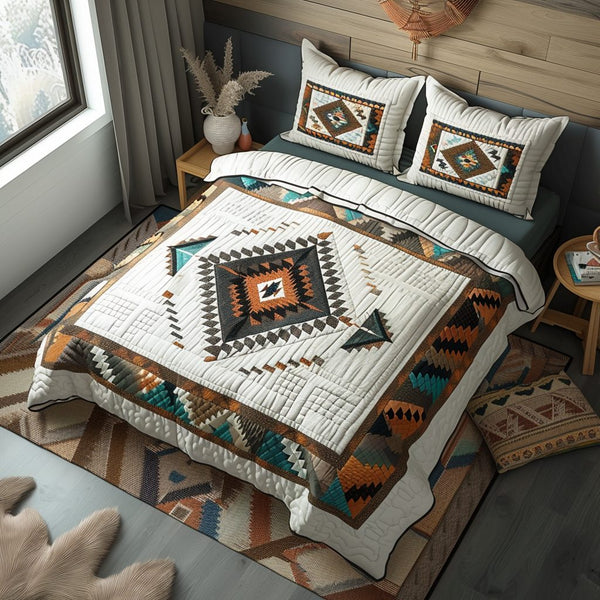 Tribal Echo quilted 3-piece bedding set on a made bed with two matching pillow shams