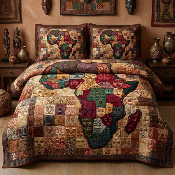 Tribal Mosaic quilted 3-piece bedding set on a made bed with two matching pillow shams