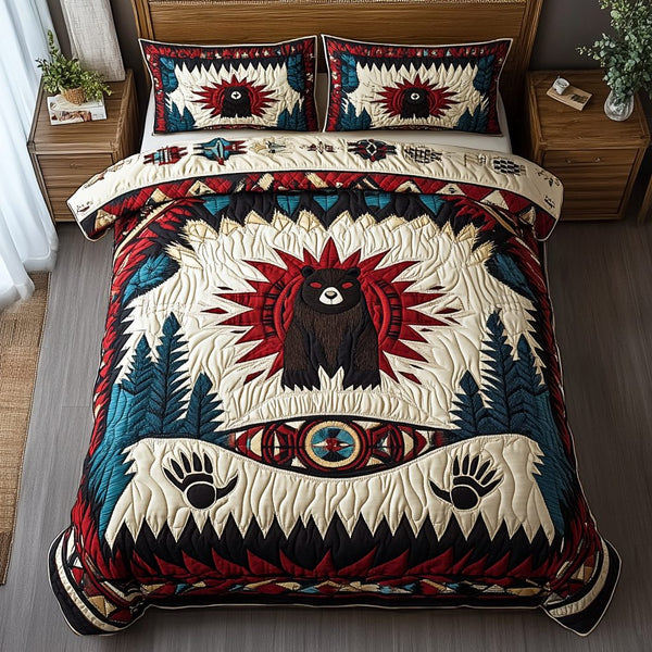 Tribal Paw Prints quilted 3-piece bedding set on a made bed with two matching pillow shams