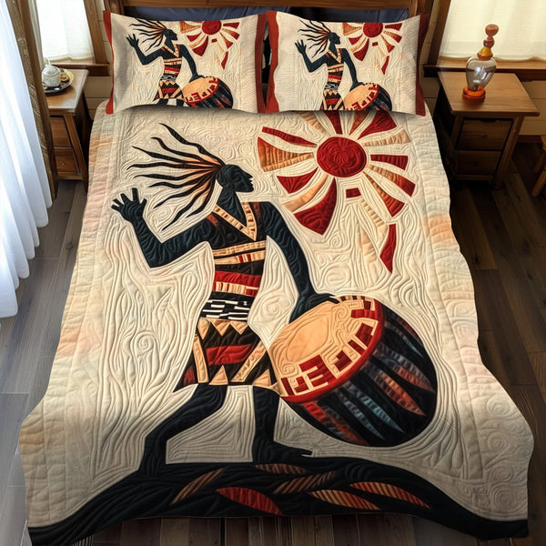 Tribal Pulse quilted 3-piece bedding set on a made bed with two matching pillow shams