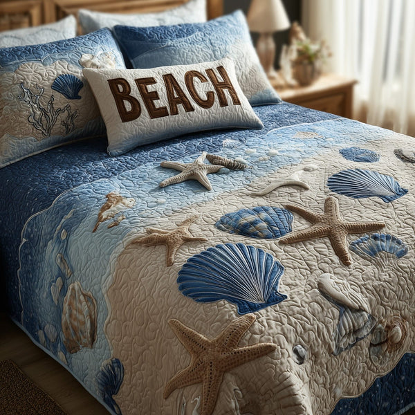 Tropical Beach quilted 3-piece bedding set on a made bed in a light coastal bedroom