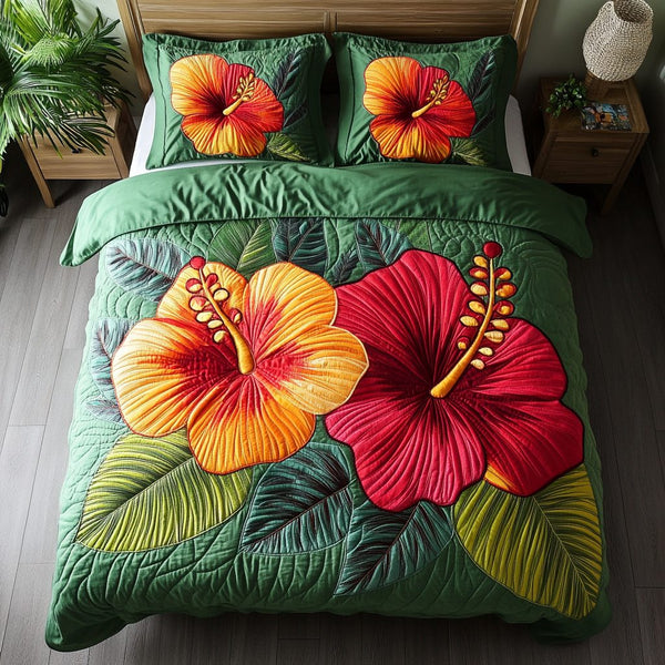 Tropical Bloom quilted 3-piece bedding set on a made bed in a light coastal bedroom
