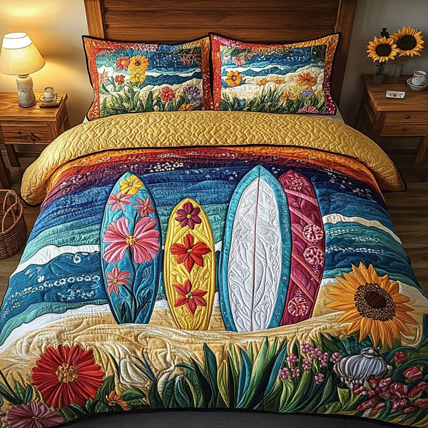 Tropical Break quilted 3-piece bedding set on a made bed in a light coastal bedroom