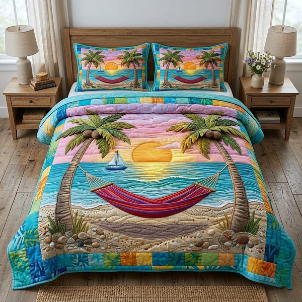 Tropical Breeze quilted 3-piece bedding set on a made bed in a light coastal bedroom