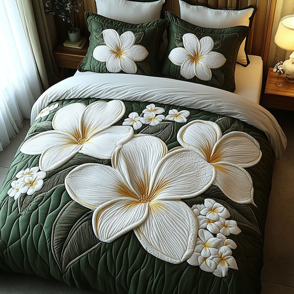 Tropical Charm quilted 3-piece bedding set on a made bed in a light coastal bedroom