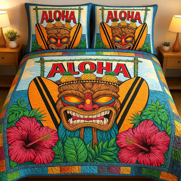Tropical Dreams quilted 3-piece bedding set on a made bed in a light coastal bedroom