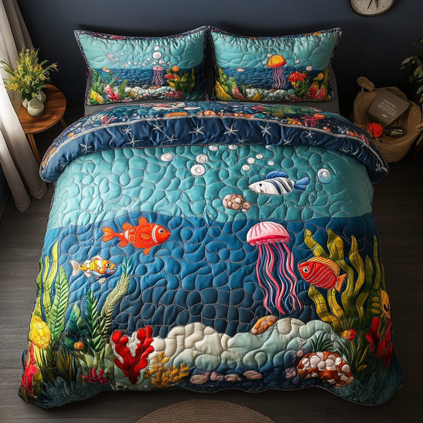 Tropical Escape quilted 3-piece bedding set on a made bed in a light coastal bedroom