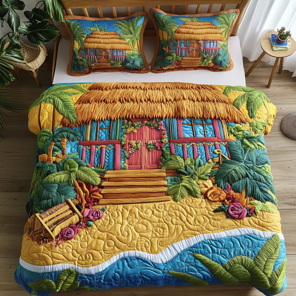 Tropical Escape quilted 3-piece bedding set on a made bed in a light coastal bedroom