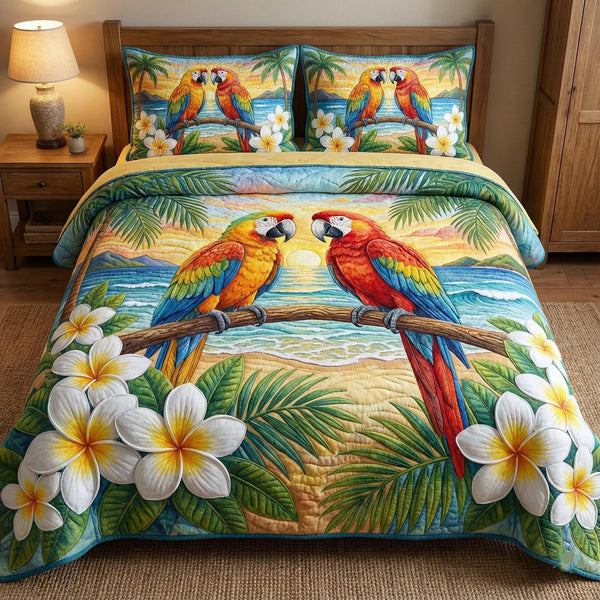 Tropical Sweethearts quilted 3-piece bedding set on a made bed in a light coastal bedroom