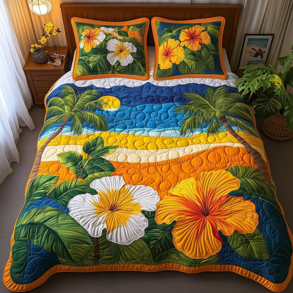 Tropical Vibe quilted 3-piece bedding set on a made bed in a light coastal bedroom