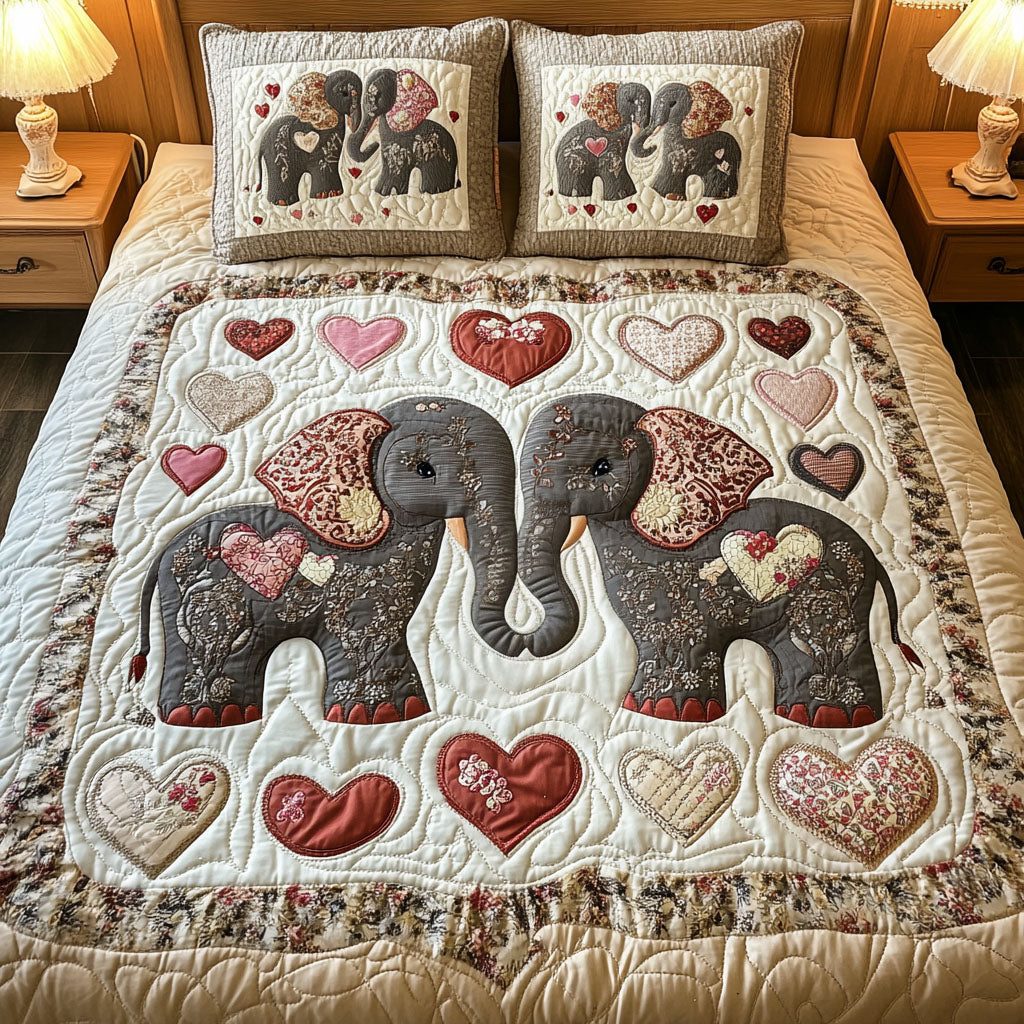 Trunk Hugs quilted 3-piece bedding set on a made bed with two matching pillow shams