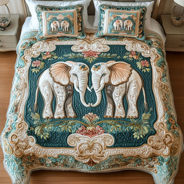 Trunk to Heart quilted 3-piece bedding set on a made bed with two matching pillow shams
