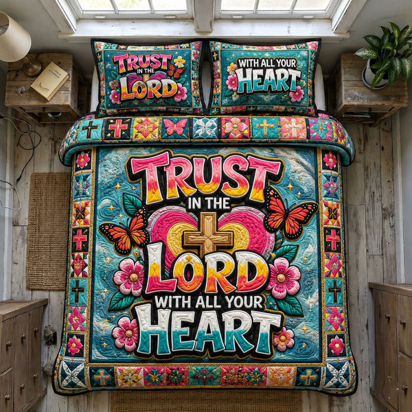 Trust In The Lord With All Your Heart quilted 3-piece bedding set on a made bed in a softly lit bedroom