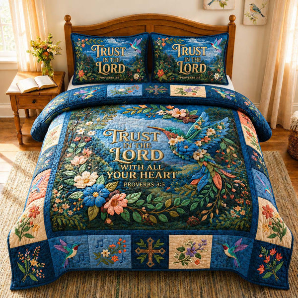Trusting Floral Grace quilted 3-piece bedding set on a made bed with two matching pillow shams