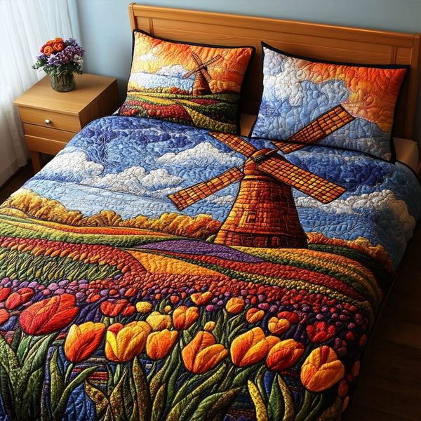 Tulip Breeze quilted 3-piece bedding set on a made bed with two matching pillow shams