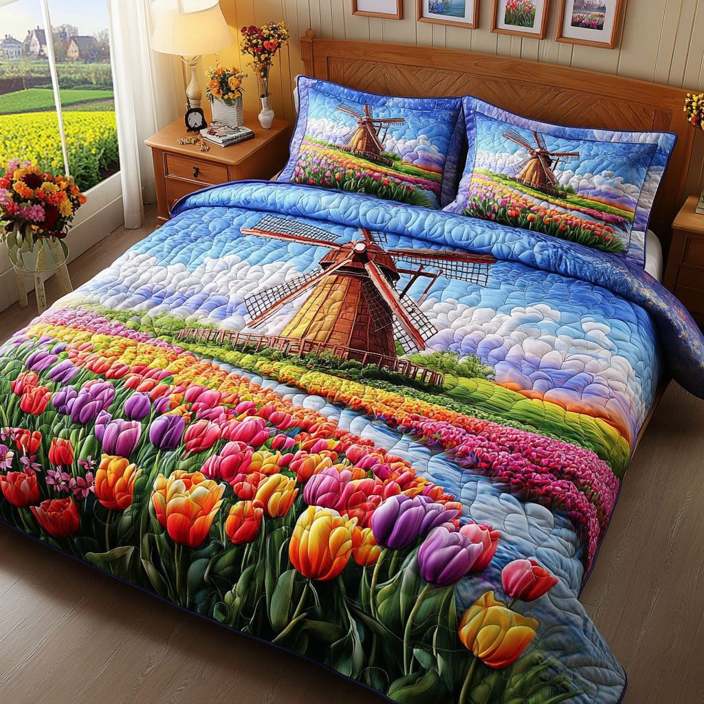 Tulip Dreams quilted 3-piece bedding set on a made bed with two matching pillow shams