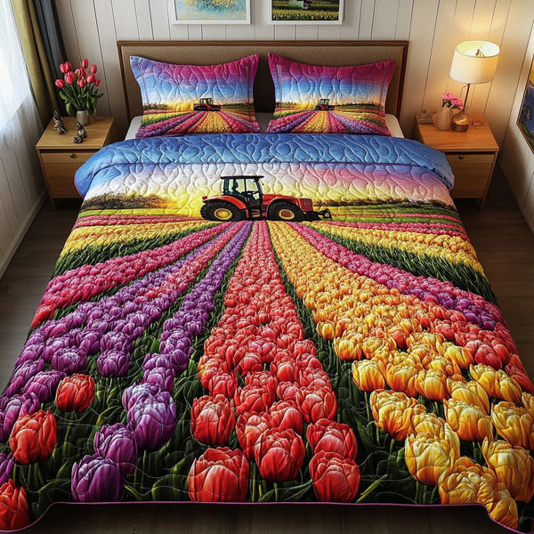 Tulip Pathway quilted 3-piece bedding set on a made bed with two matching pillow shams