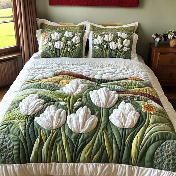 Tulip Sky quilted 3-piece bedding set on a made bed with two matching pillow shams